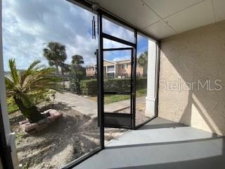 doorway to outside with expansive windows