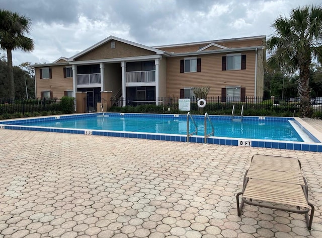 pool featuring fence