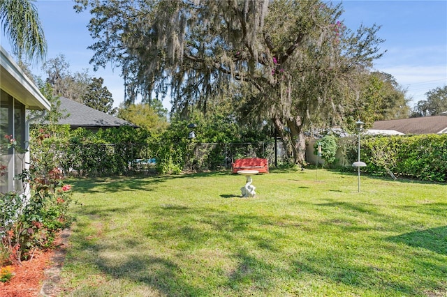 view of yard featuring fence