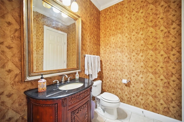 bathroom featuring baseboards, toilet, ornamental molding, tile patterned floors, and vanity