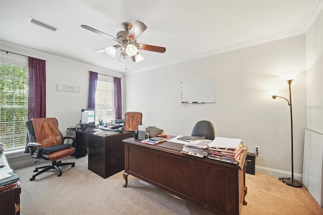 home office featuring light colored carpet, visible vents, and plenty of natural light