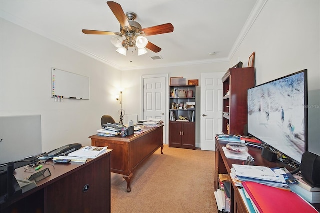 office area featuring light carpet, ceiling fan, visible vents, and crown molding