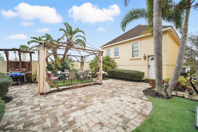 view of patio / terrace with fence and grilling area