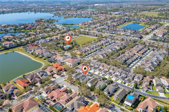 aerial view featuring a water view and a residential view