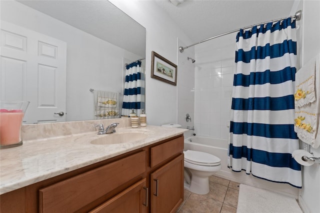 full bathroom featuring shower / tub combo, toilet, tile patterned flooring, a textured ceiling, and vanity