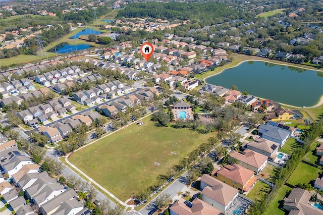 aerial view featuring a residential view and a water view