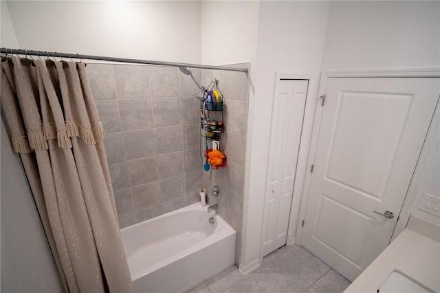 bathroom with shower / tub combo with curtain and tile patterned floors