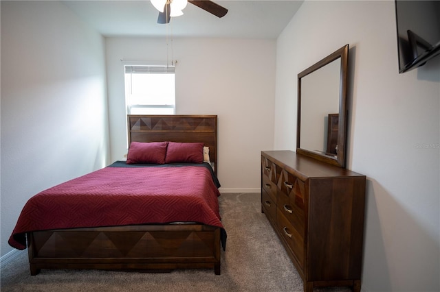 bedroom featuring carpet, ceiling fan, and baseboards