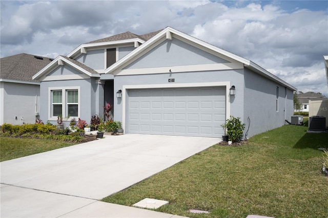 view of front of house with stucco siding, concrete driveway, a front yard, central AC, and a garage