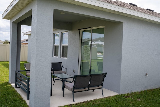 view of patio / terrace with fence