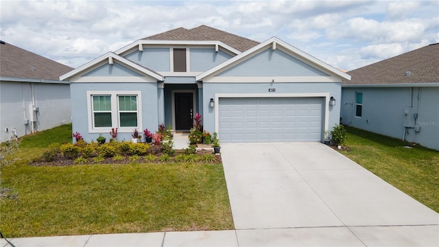 view of front facade featuring a garage, stucco siding, driveway, and a front yard