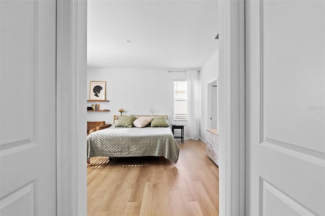 bedroom featuring light wood-type flooring