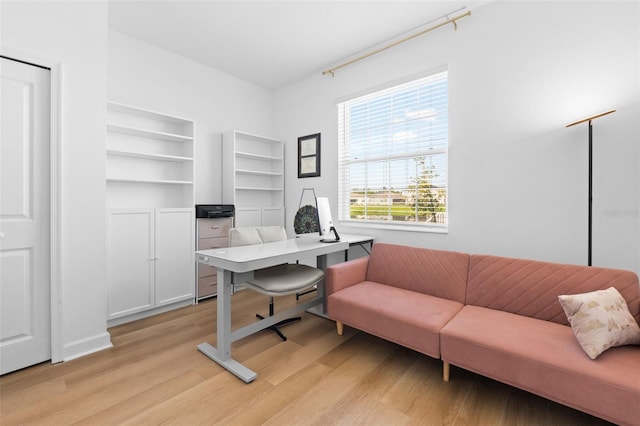 office area with light wood finished floors