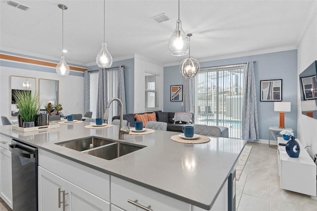 kitchen featuring a sink, dishwashing machine, visible vents, and open floor plan