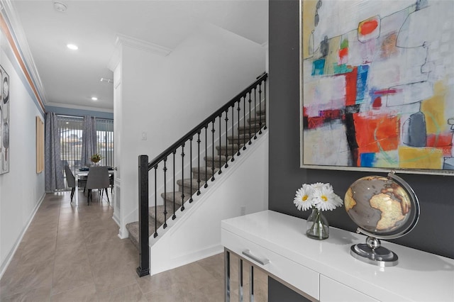 interior space with recessed lighting, baseboards, ornamental molding, and tile patterned flooring