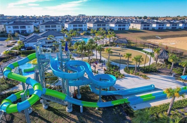 view of play area with a residential view