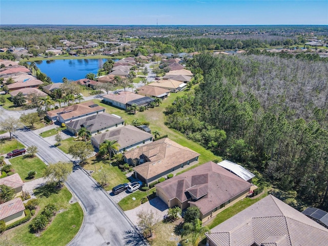 aerial view with a residential view and a water view