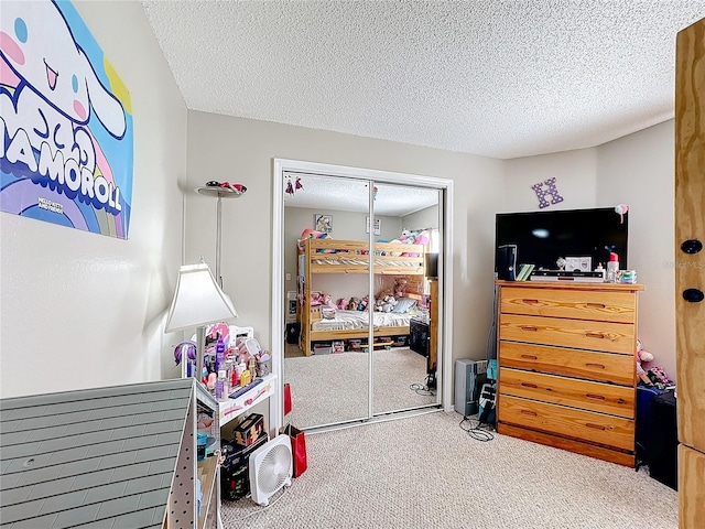 game room with carpet flooring and a textured ceiling