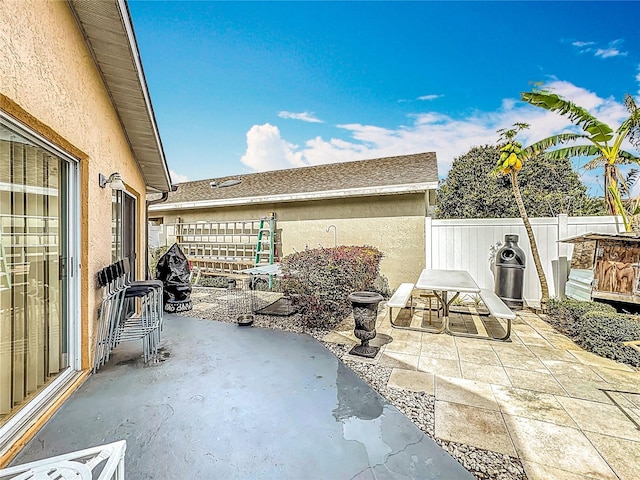 view of patio with fence