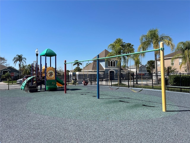 community jungle gym with fence