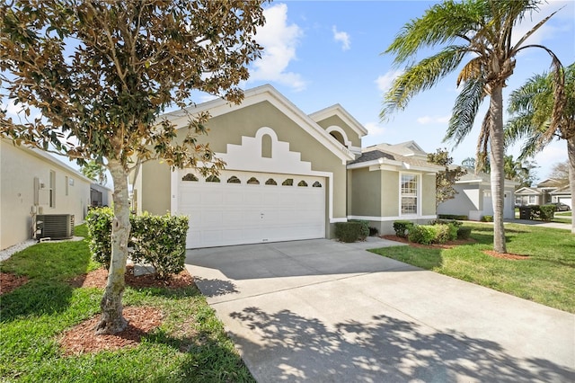 view of front of property with central air condition unit, a garage, driveway, stucco siding, and a front lawn