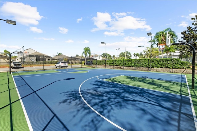 view of sport court with community basketball court and fence