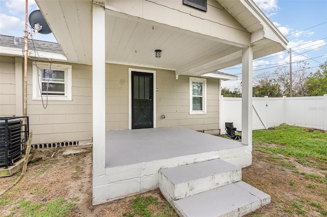 view of patio with a fenced backyard and central AC