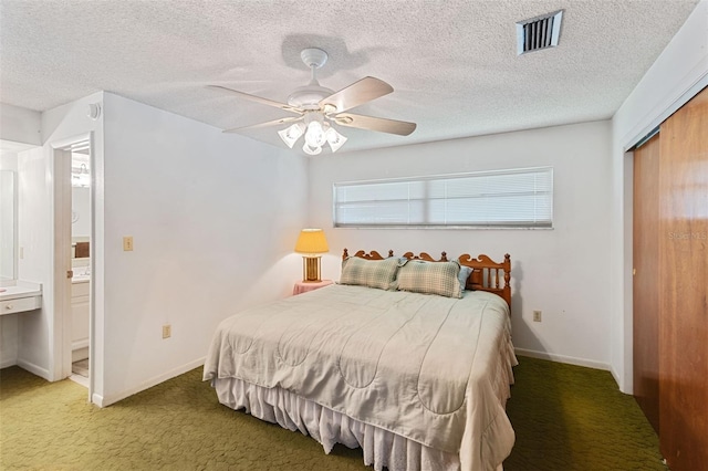 bedroom with baseboards, visible vents, a textured ceiling, and carpet flooring