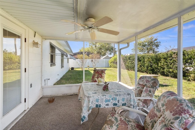 sunroom / solarium with ceiling fan