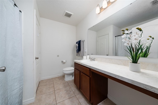 full bathroom with toilet, tile patterned flooring, visible vents, and vanity