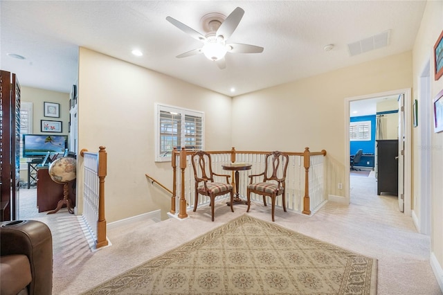 1686 Shadowmoss Cir, Lake Mary, FL 32746 - sitting room with an upstairs landing, light carpet, ceiling fan, and recessed lighting