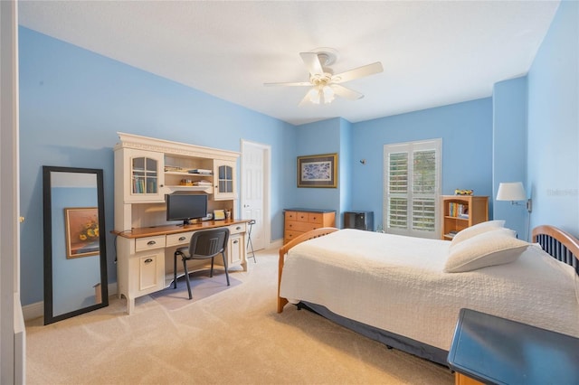 1686 Shadowmoss Cir, Lake Mary, FL 32746 - bedroom featuring light carpet, baseboards, ceiling fan, and a desk
