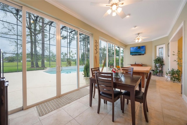 1686 Shadowmoss Cir, Lake Mary, FL 32746 - dining space featuring ceiling fan, crown molding, and light tile patterned floors