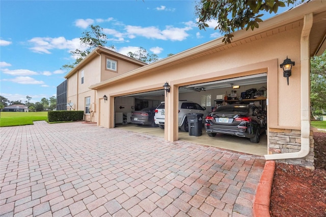 1686 Shadowmoss Cir, Lake Mary, FL 32746 - view of vehicle parking with decorative driveway and an attached garage