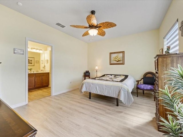 bedroom with ensuite bathroom, ceiling fan, visible vents, baseboards, and light wood-type flooring