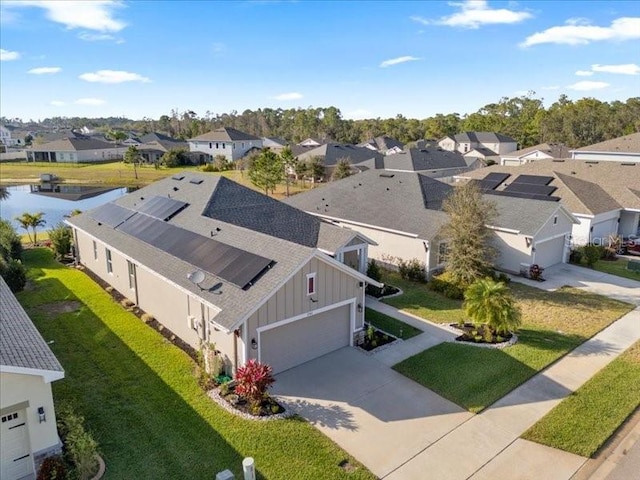 drone / aerial view featuring a residential view