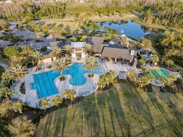 birds eye view of property featuring a water view