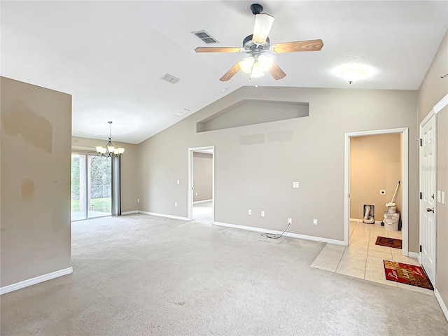 unfurnished room with lofted ceiling, ceiling fan with notable chandelier, visible vents, and light colored carpet