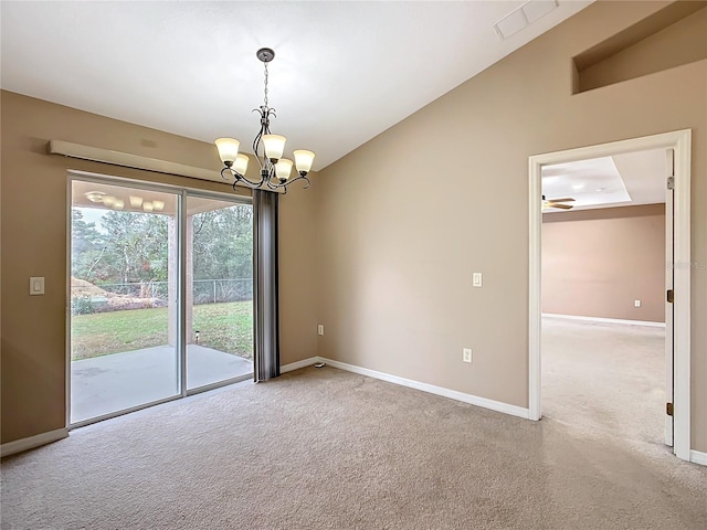 carpeted spare room featuring lofted ceiling, visible vents, baseboards, and a chandelier