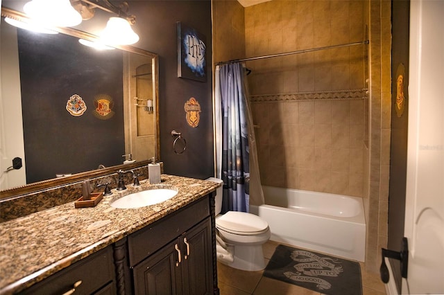 bathroom featuring vanity, tile patterned floors, shower / tub combo, and toilet