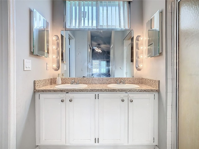 bathroom with double vanity and a sink