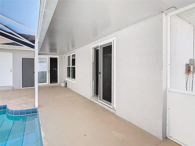 view of patio with an outdoor pool