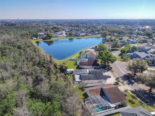 bird's eye view featuring a residential view and a water view