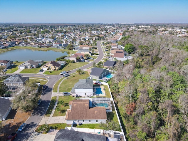 aerial view featuring a water view and a residential view