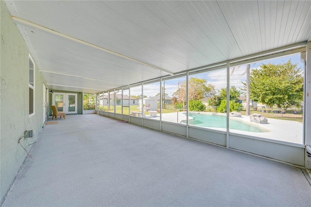 unfurnished sunroom featuring plenty of natural light