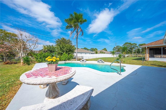 view of swimming pool with a yard, a patio, a fenced backyard, and a fenced in pool