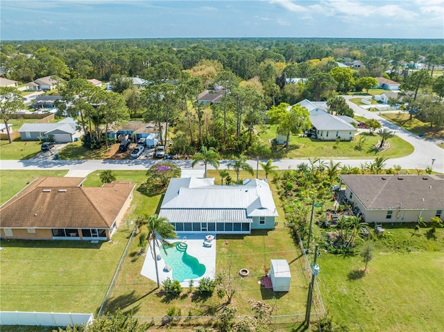 drone / aerial view with a view of trees