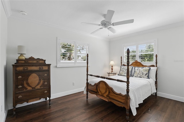 bedroom with baseboards, ornamental molding, ceiling fan, and wood finished floors