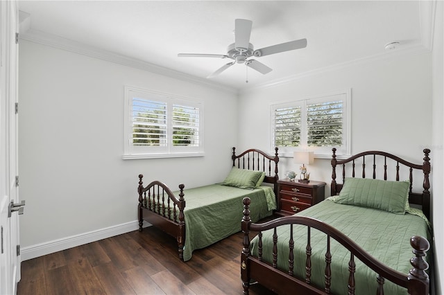 bedroom featuring ornamental molding, wood finished floors, a ceiling fan, and baseboards
