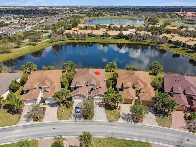 aerial view featuring a water view and a residential view